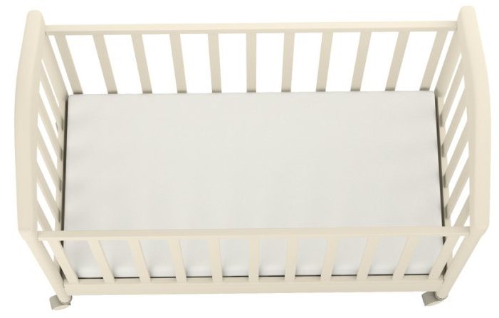 biely detský matrac v jednoduchej bielej postieľke